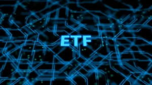 Glowing blue ETF lettering sits centered on a dark digital circuit board pattern with blue network lines.