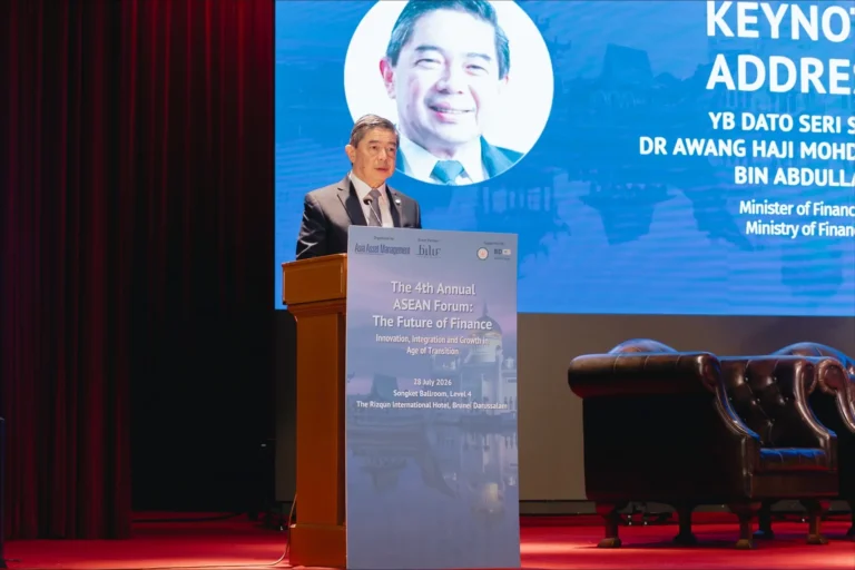 Brunei Finance Minister II Dr Awang Haji Mohd Amin Liew Abdullah speaks at a podium during the 4th Annual ASEAN Forum.