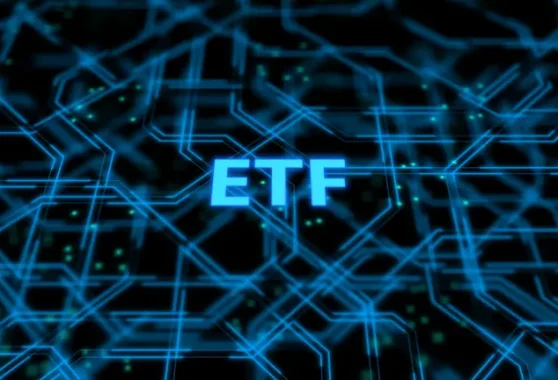 Glowing blue ETF lettering sits centered on a dark digital circuit board pattern with blue network lines.